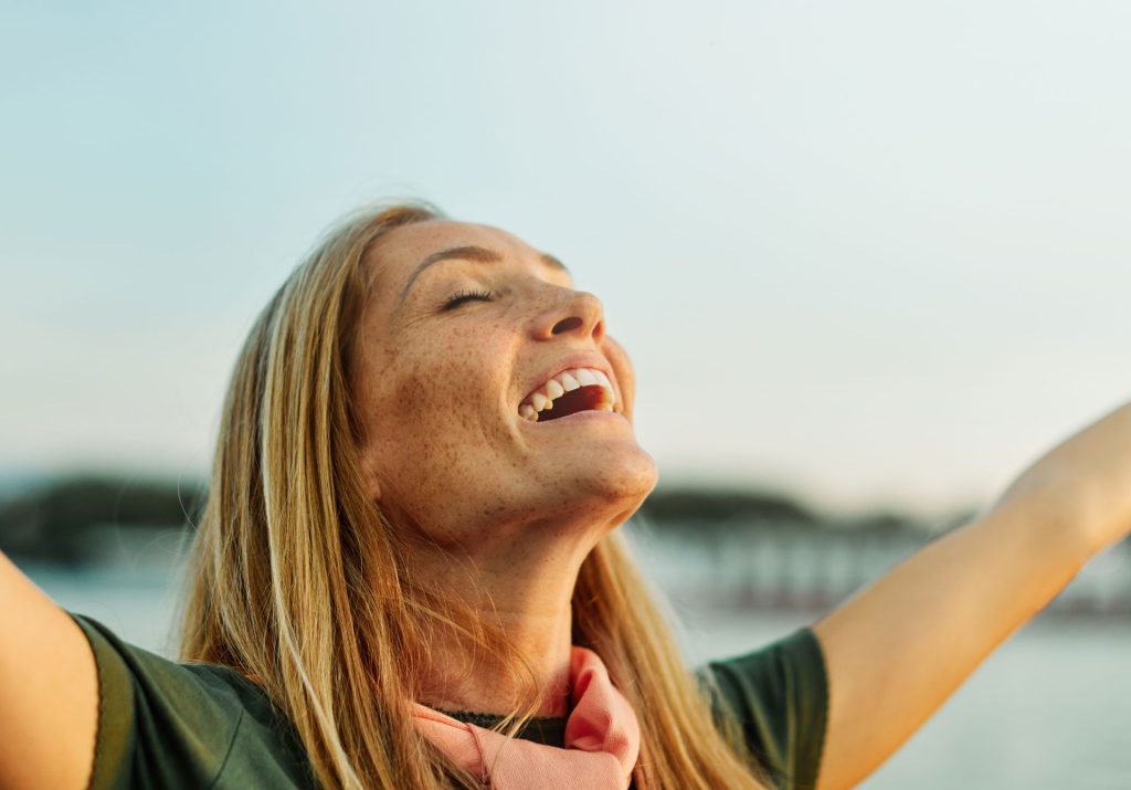 Happy woman outdoor.