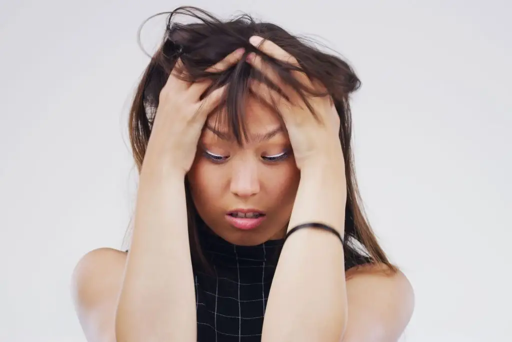 Young asian woman with anxiety.