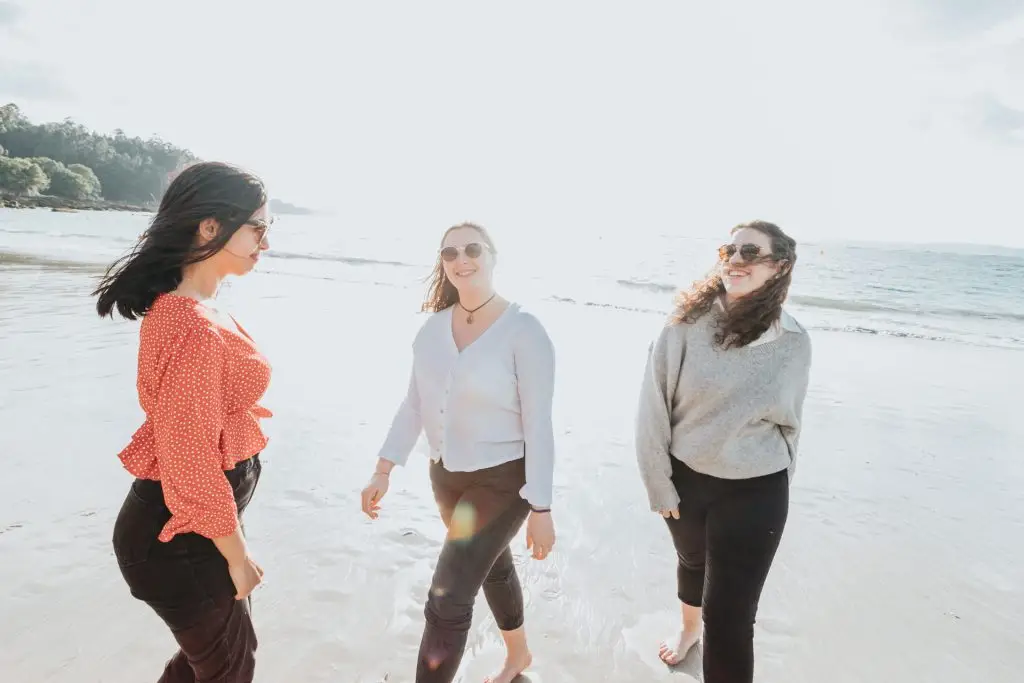 Group of friends having fun at the beach.