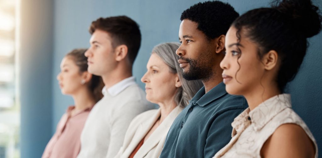 Business people sitting in a row.