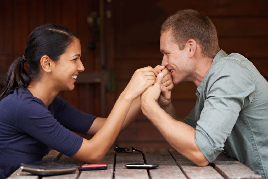 Couple happy as one of the benefits of couples therapy.