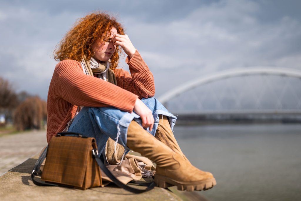 Exhausted woman with anxiety.