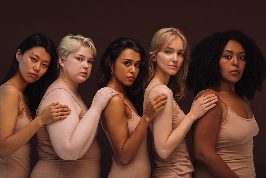 Five races of woman with vulnerability, different body types.