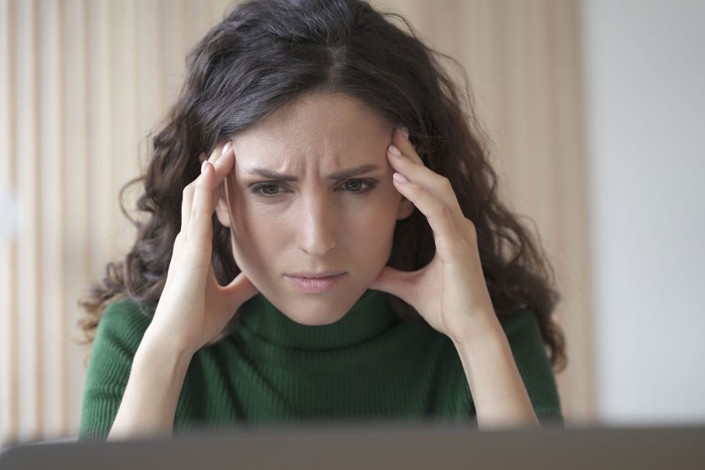 Stressed young woman.