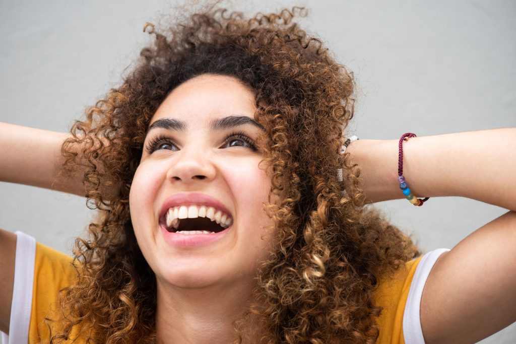 Happy woman with good mental health.