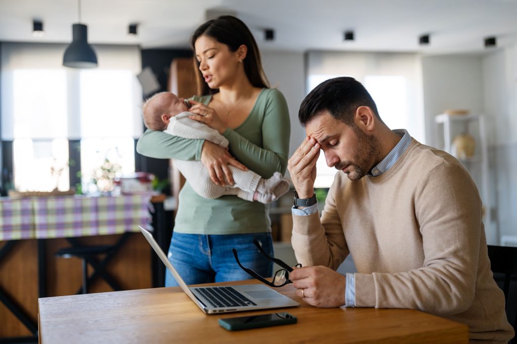 Tired couple with a baby.