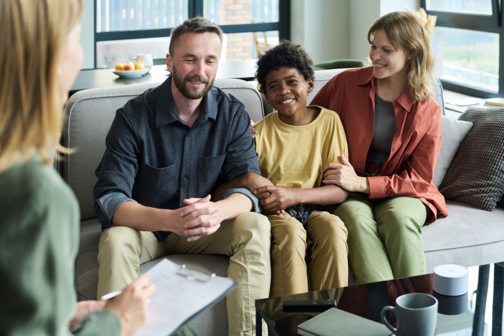 Counseling session with multiracial family.