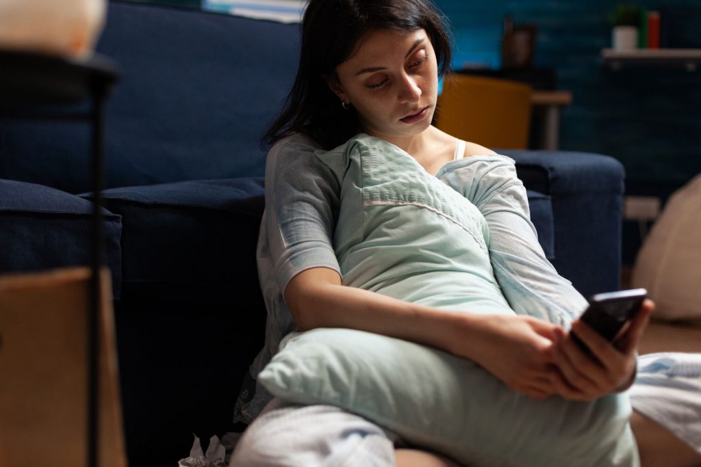 Worried woman after giving birth.