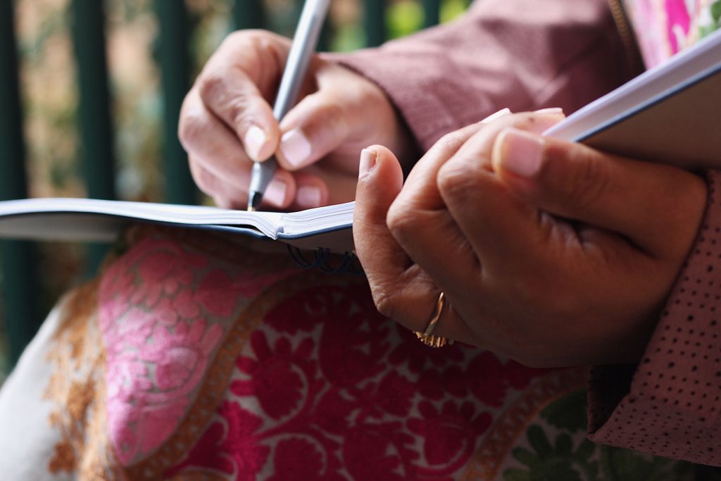 Woman journaling.
