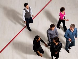 Business people crossing the red line.