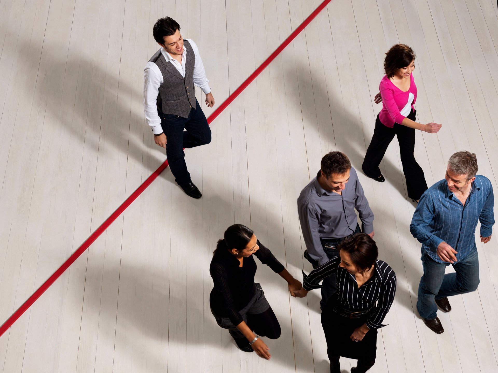 Business people crossing the red line.