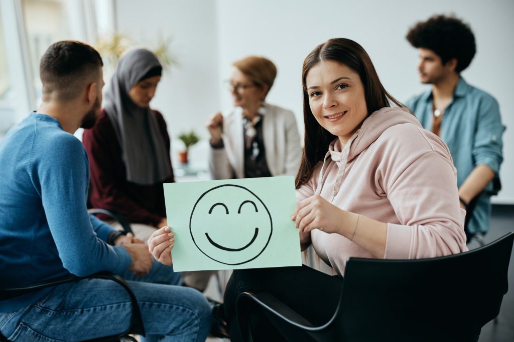 Smiling person with good mental health.