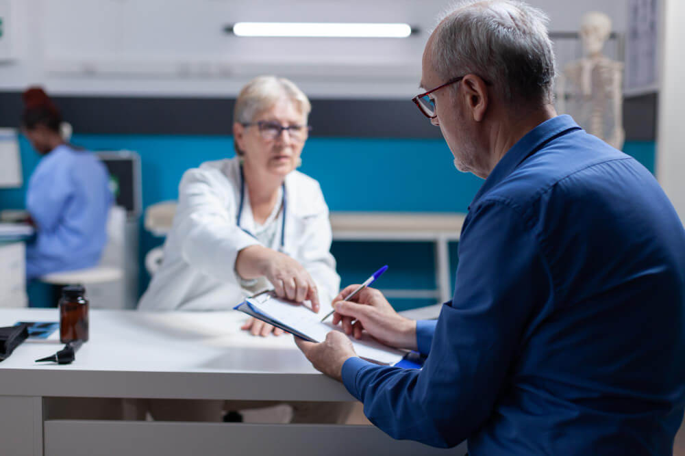 Patient reviewing mental health insurance options at Los Angeles Therapy Institute
