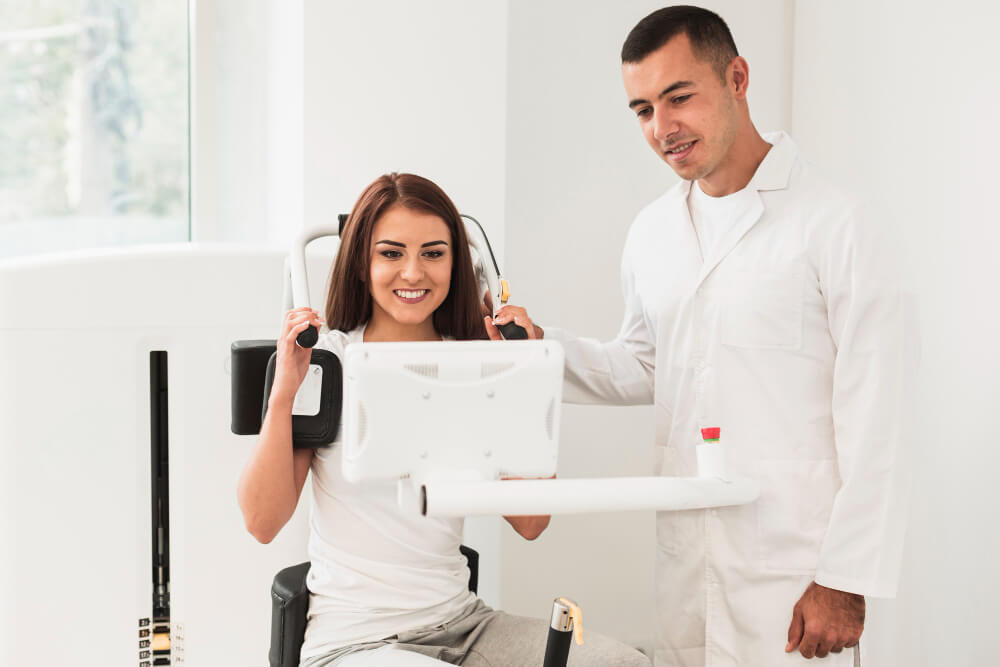 Patient utilizing innovative somatic equipment for yoga therapy at Los Angeles Therapy Institute