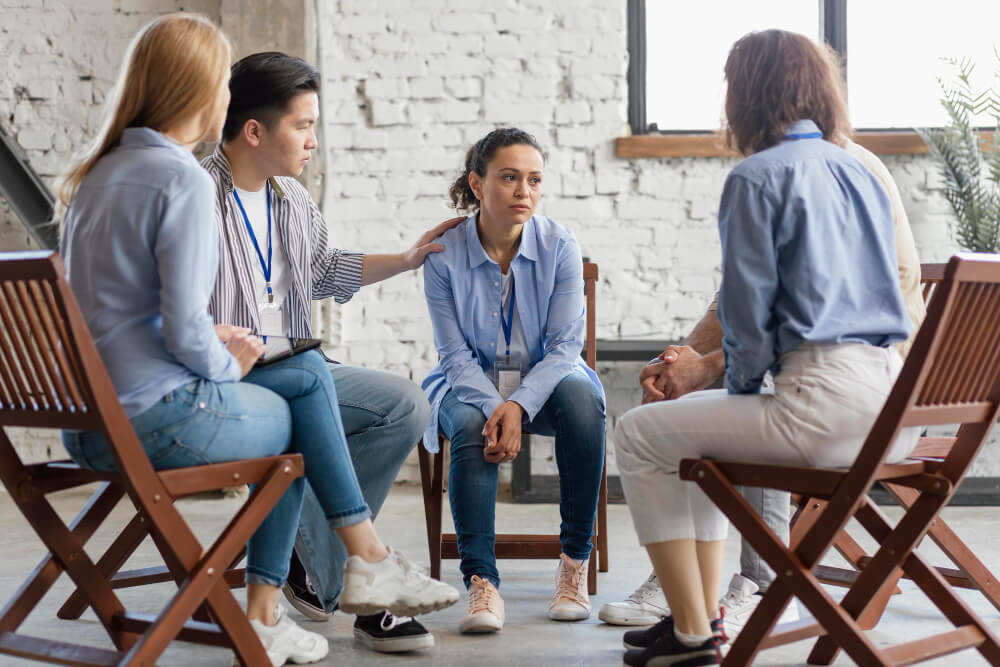 Diverse group participating in supportive family therapy sessions at Los Angeles Therapy Institute